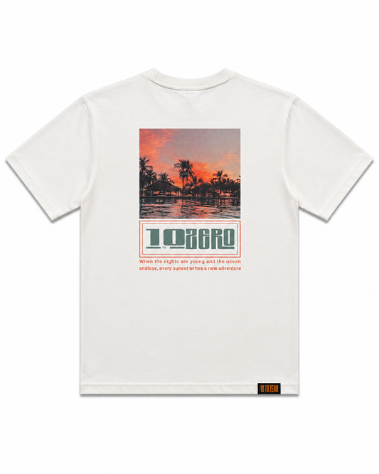 Palmcode Tee in Off White – back view with sunset palm tree photo print and 10 to Zero graphic