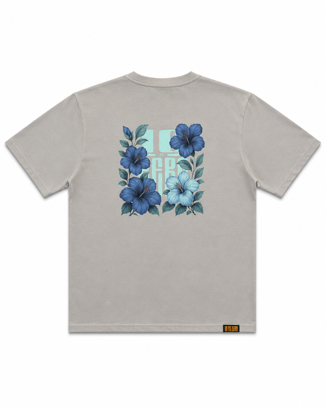 Blue Sauvage Tee in Dizzle Grey – back view with blue hibiscus floral print over 10 to Zero graphic